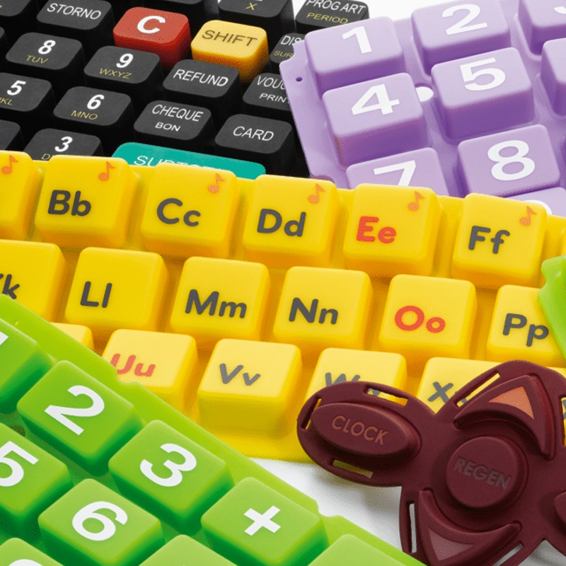 How Are Graphics and Colors Applied to Silicone Rubber Keypads in Manufacturing1